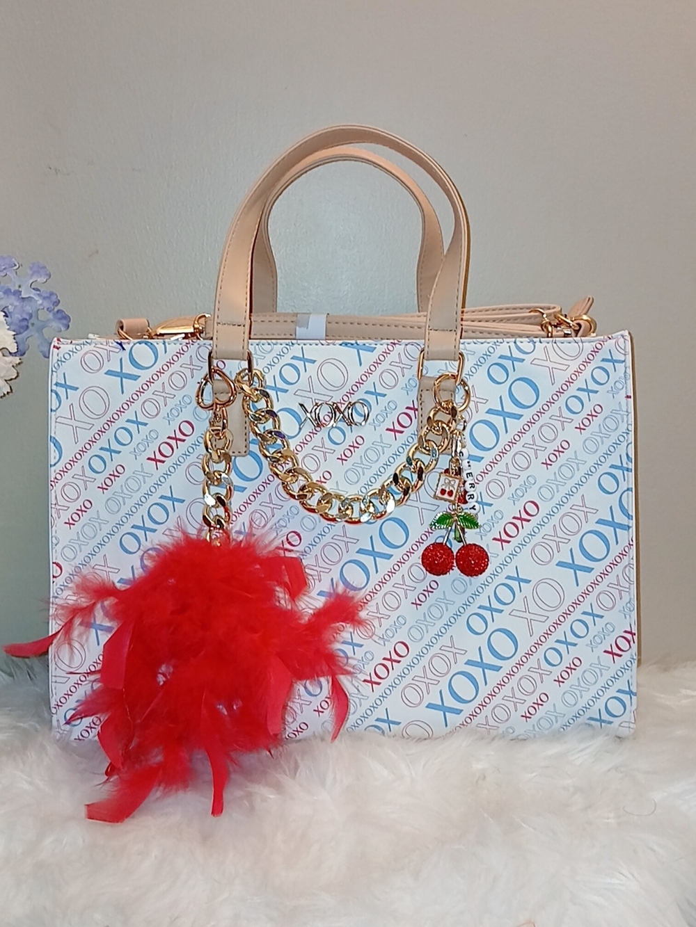 XOXO White Logo Tote with Beige Handles and Red Feather Charm